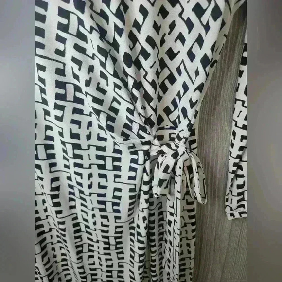 Ann Klein black and white design dress with orange strip stripe on bottom. - Picture 3 of 6